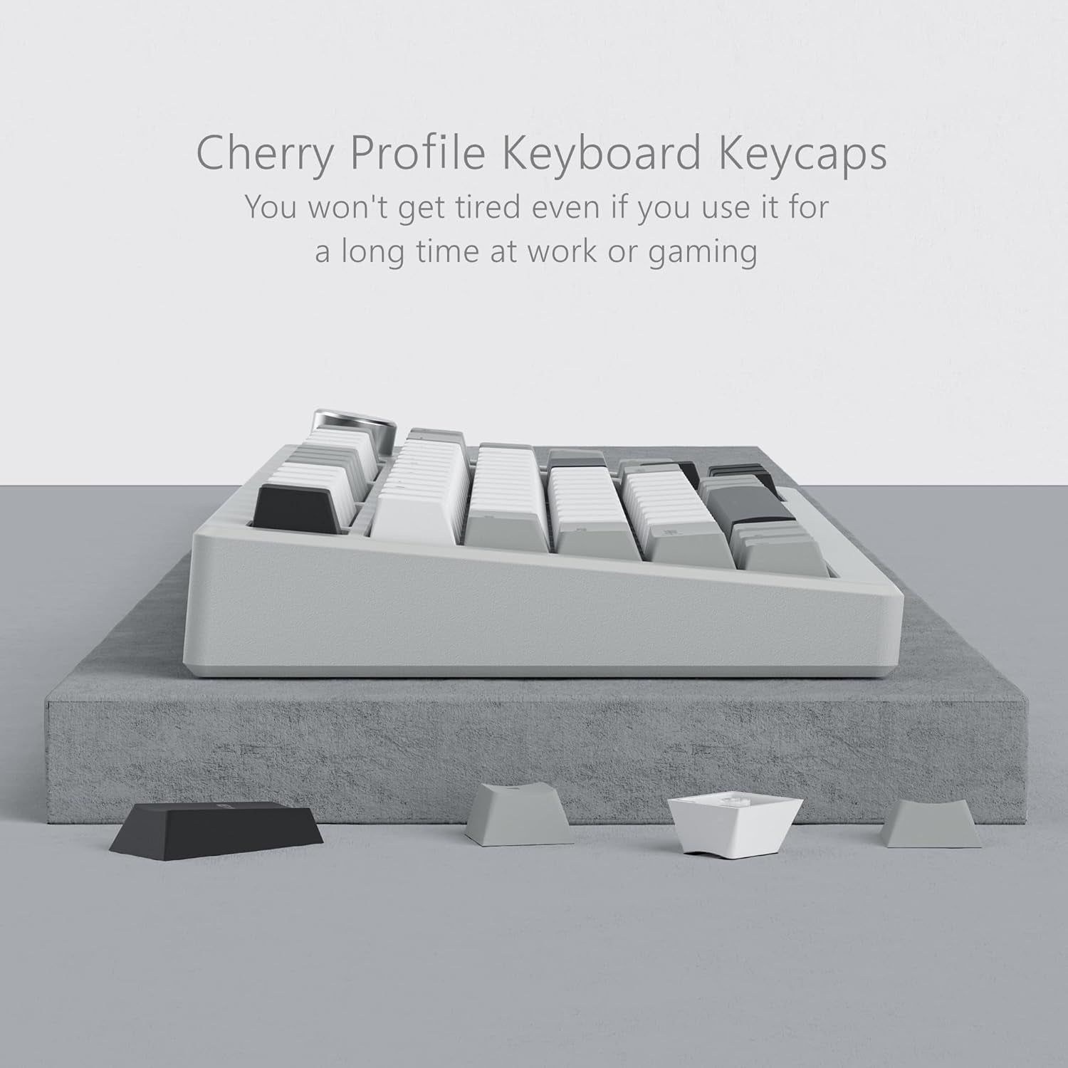 Side profile view of a mechanical keyboard with Cherry profile PBT keycaps showing the sculpted row height differences for ergonomic typing comfort