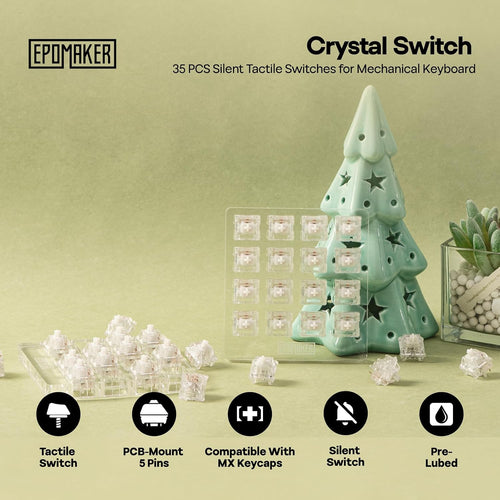Epomaker Crystal Switch 35-pack silent tactile mechanical keyboard switches displayed with ceramic Christmas tree decoration on sage green background