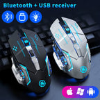 Black and silver gaming mice with blue RGB lighting resting on a black keyboard, with cyan text reading "Bluetooth + USB receiver" and three blue circle icons showing Bluetooth, USB, and a lightbulb, plus a pill-shaped badge showing Apple, Windows, and Android logos in the bottom right corner