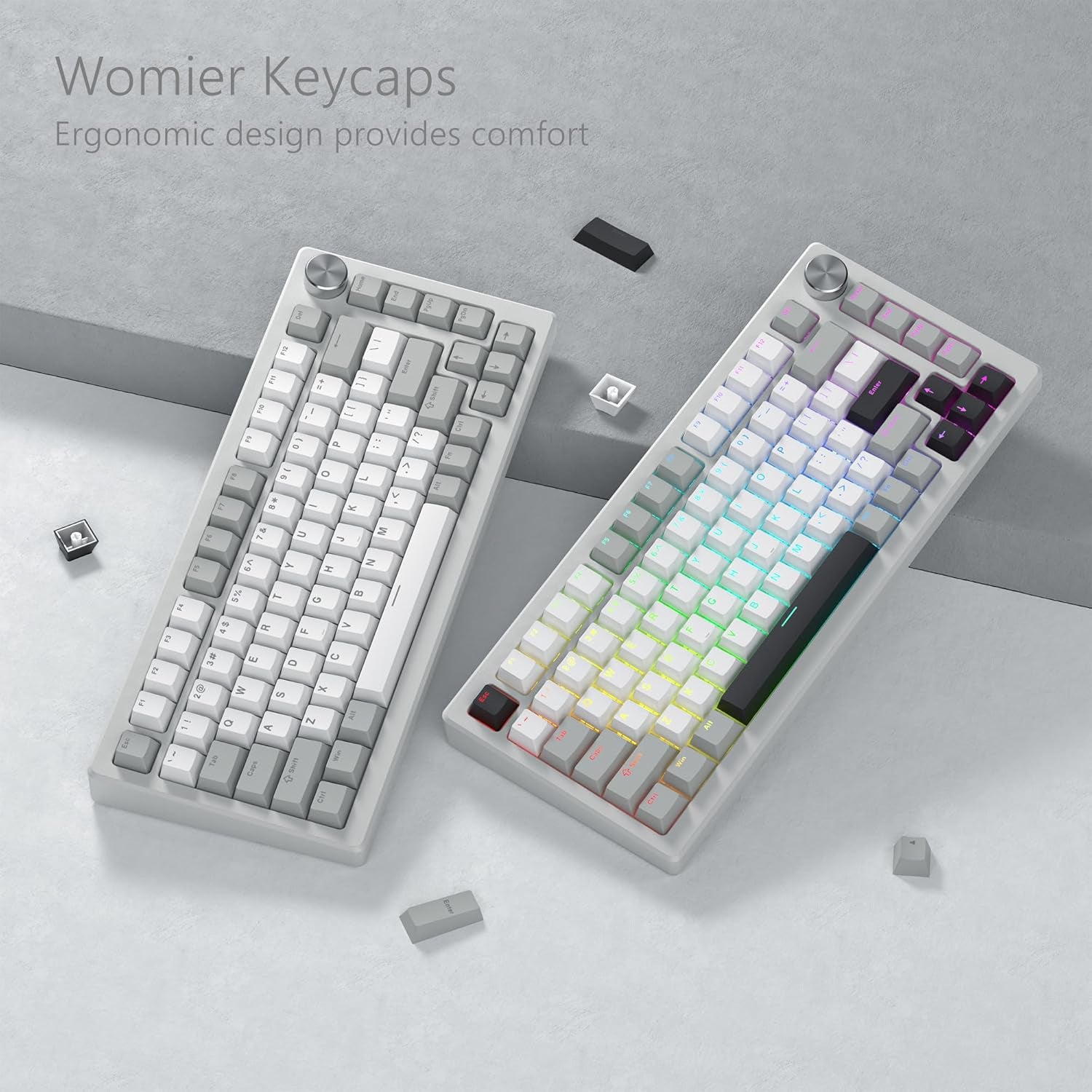 Two mechanical keyboards side by side showing Womier creamy keycaps installed, one with RGB backlight shining through the legends