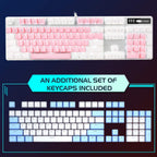 MageGee Keyboard with pink and white keycaps and additional blue and white keycaps set on a dark background