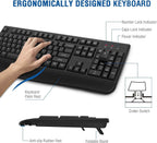 Black ergonomic wireless keyboard shown at an angle on a white background with a hand resting on the keys, bold blue text reading "Ergonomically Designed Keyboard" at the top, and six labeled callouts identifying: Number Lock Indicator, Caps Lock Indicator, Power Indicator, Keyboard Palm Rest, Crater-Switch diagram, Anti-slip Rubber Feet, and Foldable Stand with a side profile view of the keyboard shown below