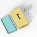 BONAI 12,000 mAh mint portable power bank next to packaging, user manual, and USB-C to USB-A cable on white background