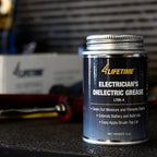 4LifetimeLines electrician's dielectric grease 4oz can on a workbench in a garage