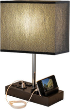 USB Table Lamp with USB Ports charging a smartphone with a video playing in a phone stand on a white background