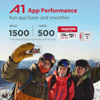 Gigastone 256GB Camera Plus microSD card showing A1 app performance with 1500 read and 500 write IOPS, with skiers taking a selfie on a mountain