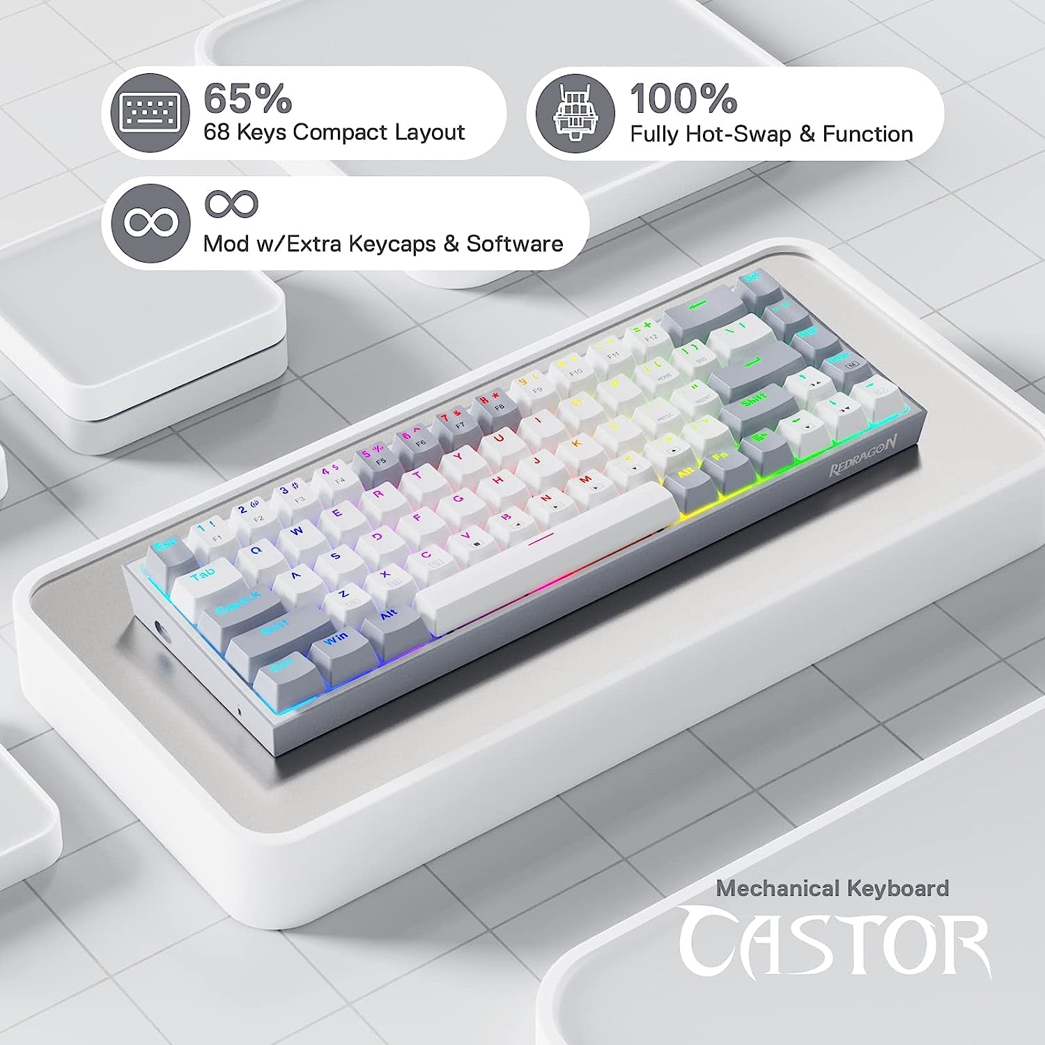 Redragon K631 Gery compact mechanical keyboard on white display tray with feature callouts highlighting 65% layout, 100% hot-swap, and mod support