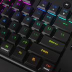 Close-up of Redragon K618 PRO low-profile keycaps showing Mac layout with Command, Alt, Fn, Shift, Ctrl, Control, and Enter keys illuminated in rainbow RGB gradient from blue to green to yellow to red, with M1 macro button visible in upper right corner
