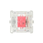 Keyboard switch with red actuator on a white background top-view