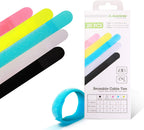 Colored velcro cable ties and rolled-up cable tie next to white 20-pack cable ties package on a white background