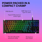 HyperX Alloy Origins Core - TKL Wired Mechanical Gaming Keyboard with RGB LED Backlights and USB-C to USB-A Cable on purple and pink gradient background