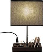 Desk lamp charging station with wooden phone stand base and USB ports on white background