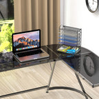 Glass desk with a laptop and 6-tier documents organizer with office supplies on it in a room with a wooden floor and white walls