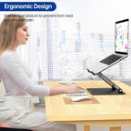 LS10 Ergonomic Adjustable Aluminum Laptop Stand with a laptop, keyboard, and mouse desk setup being used by a woman, side view